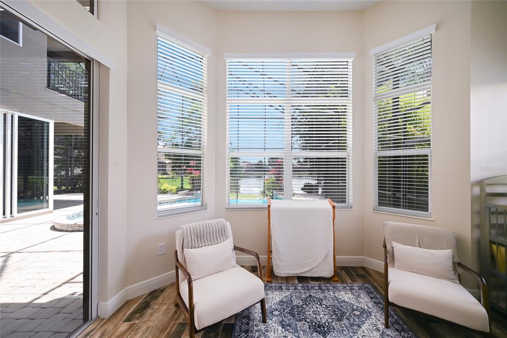 14806 Bowfin Terrace Lakewood Ranch, FL 34202 - Photo 29 of 58 a living room with furniture and a window