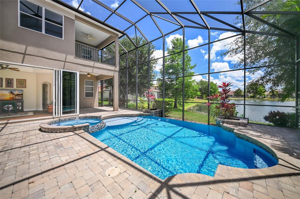 14806 Bowfin Terrace Lakewood Ranch, FL 34202 - Photo 3 of 58 a view of a backyard with sitting area