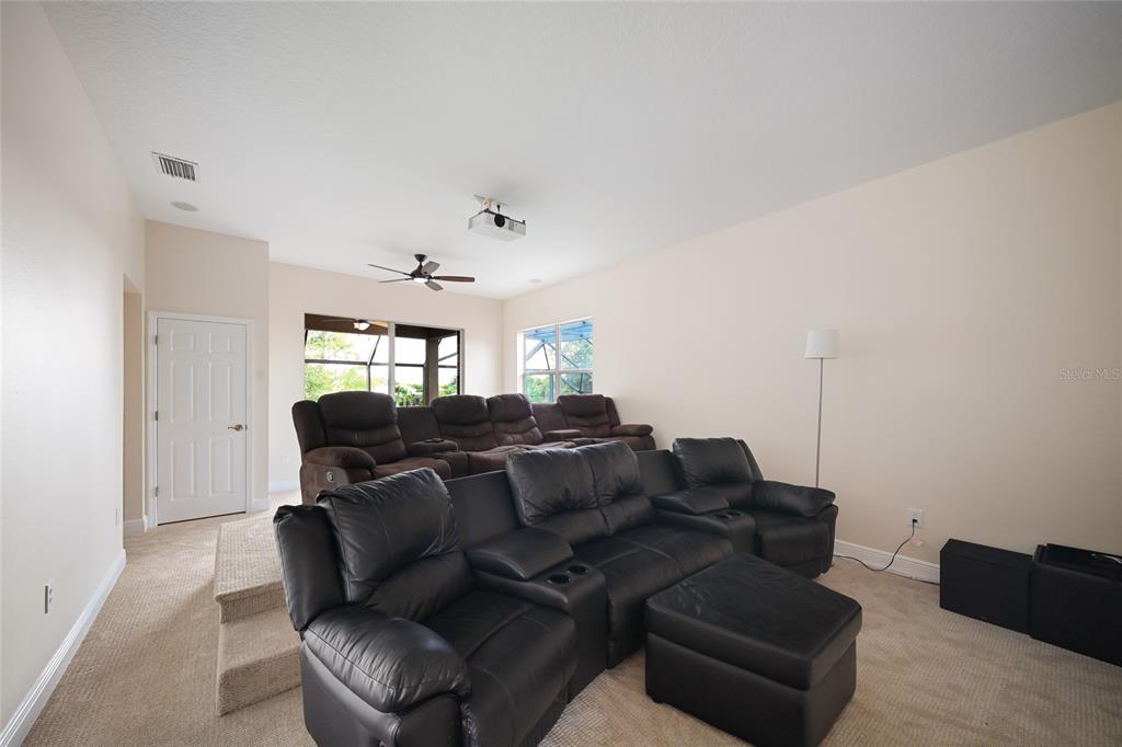 14806 Bowfin Terrace Lakewood Ranch, FL 34202 - Photo 39 of 58 a living room with furniture