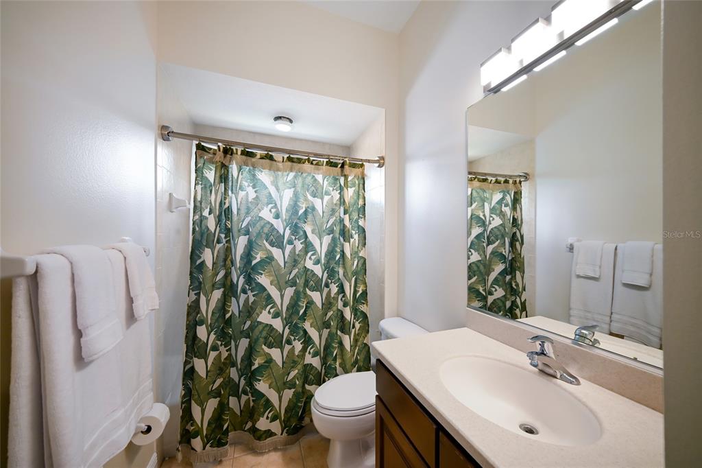 14806 Bowfin Terrace Lakewood Ranch, FL 34202 - Photo 43 of 58 a bathroom with a sink toilet and mirror