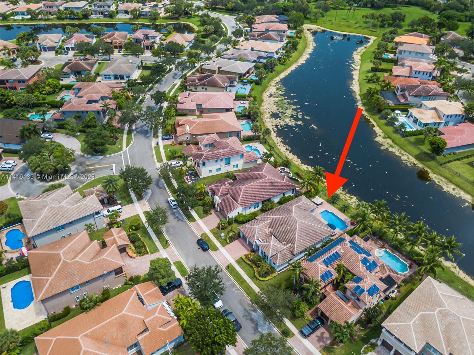 7982 Northwest 109th Lane Parkland, FL 33076 - Photo 38 of 71 an aerial view of a houses with outdoor space