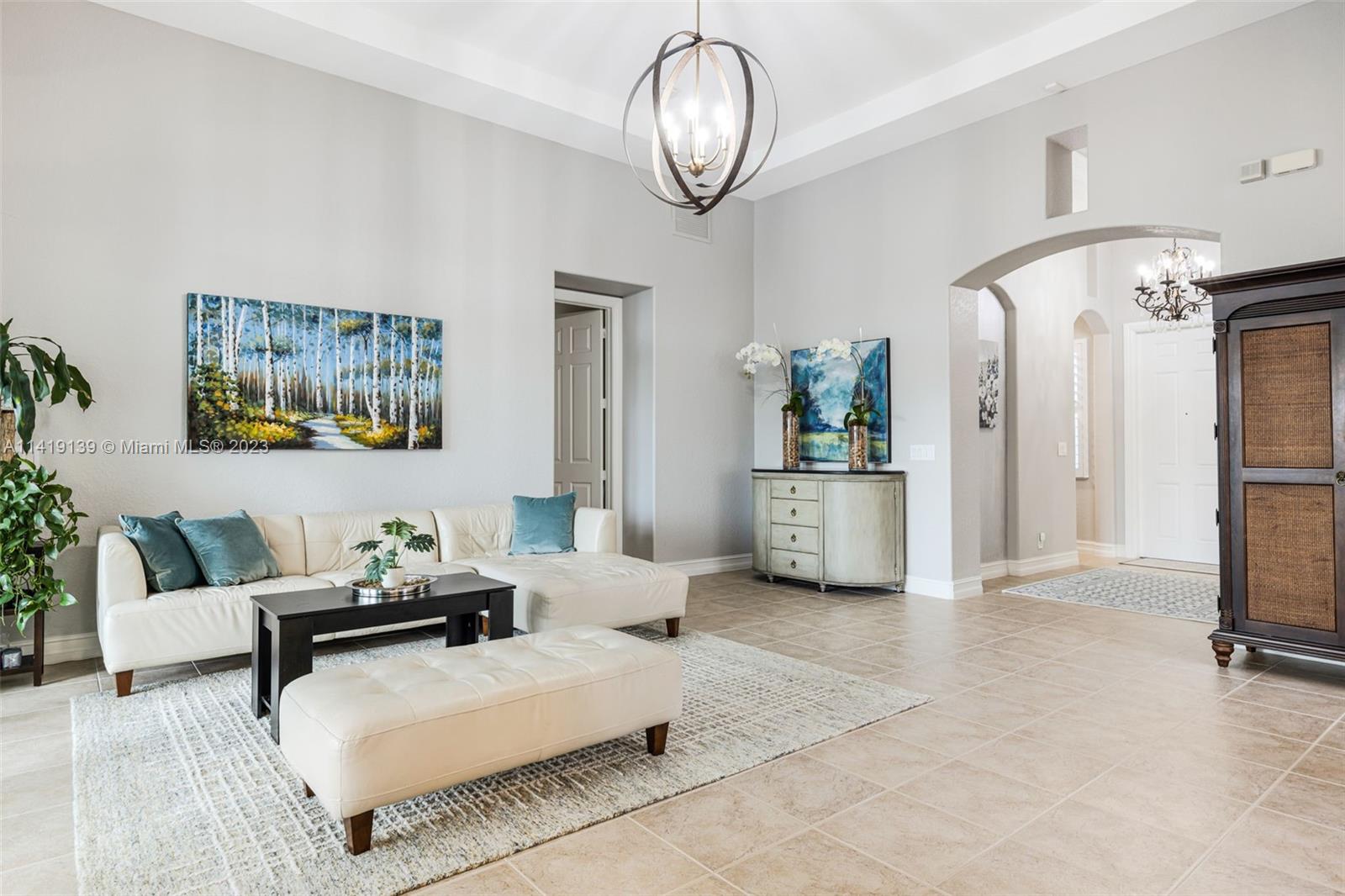 7982 Northwest 109th Lane Parkland, FL 33076 - Photo 4 of 71 a living room with furniture
