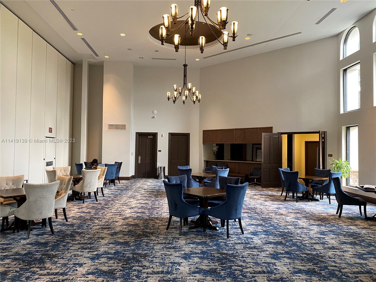 7982 Northwest 109th Lane Parkland, FL 33076 - Photo 57 of 71 a view of a dining room with furniture window and wooden floor