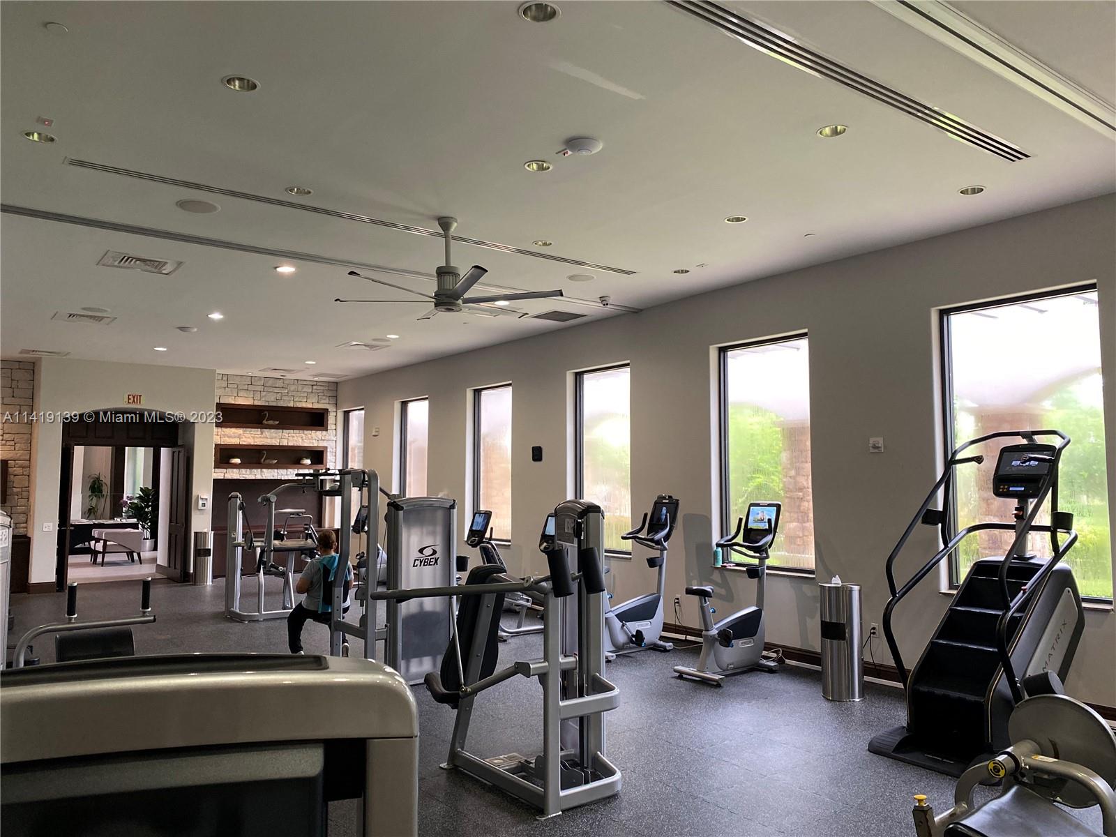 7982 Northwest 109th Lane Parkland, FL 33076 - Photo 58 of 71 a view of a room with gym equipment