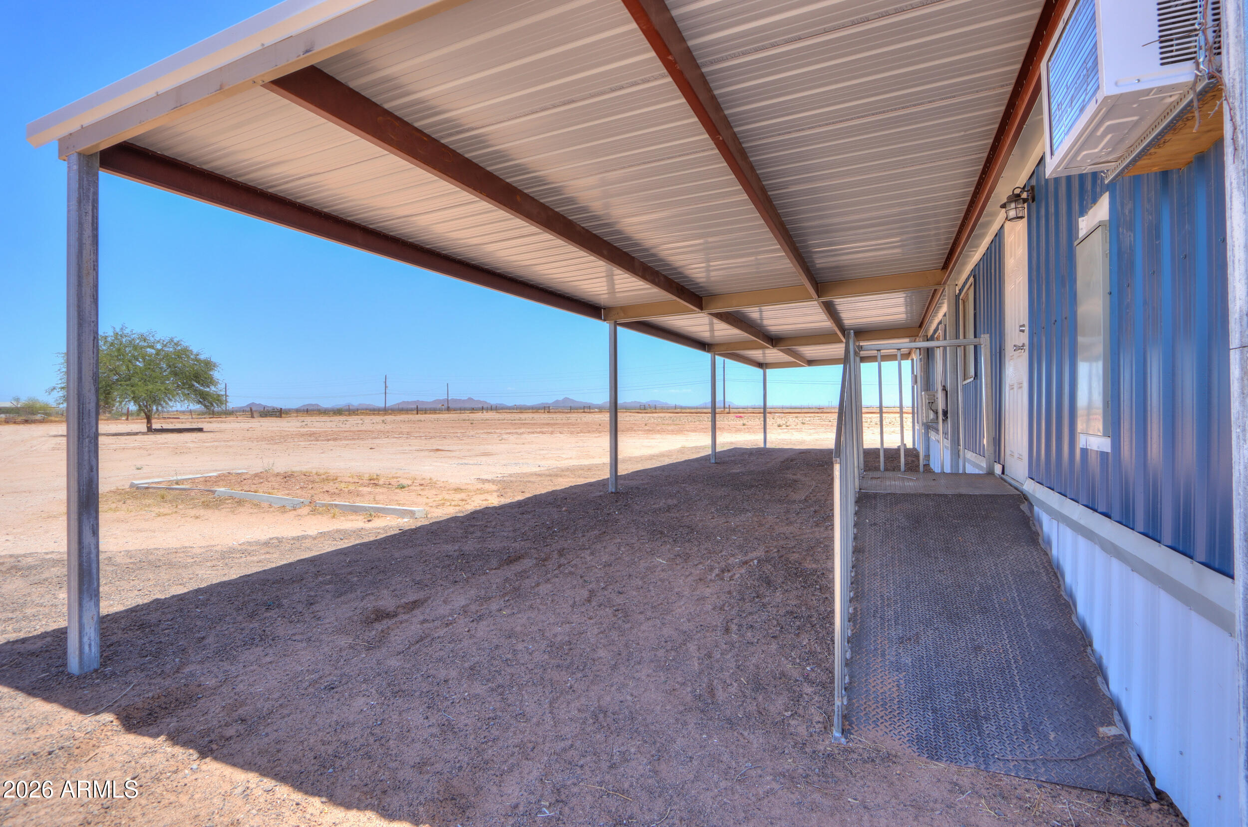 33776 West Siesta Road Stanfield, AZ 85172 - Photo 4 of 54 a view of a backyard of the house