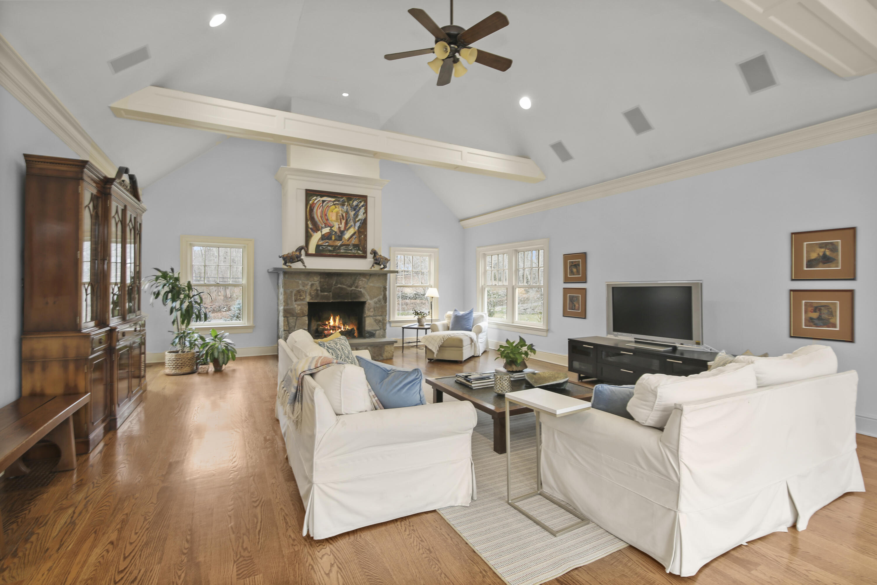 346 Frogtown Road New Canaan, CT 06840 - Photo 13 of 36 a living room with furniture fireplace and flat screen tv