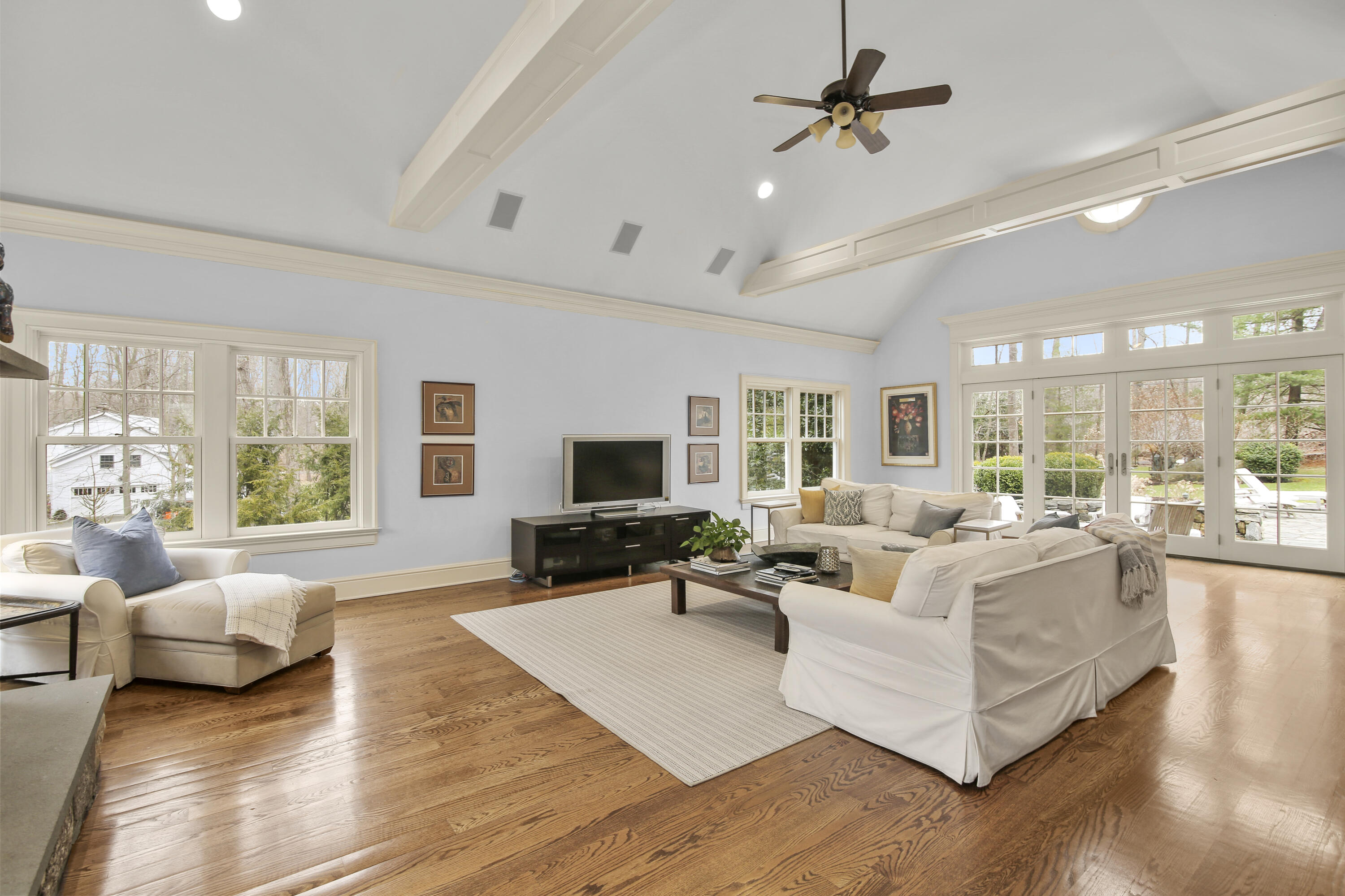 346 Frogtown Road New Canaan, CT 06840 - Photo 14 of 36 a living room with furniture or couches and a flat screen tv