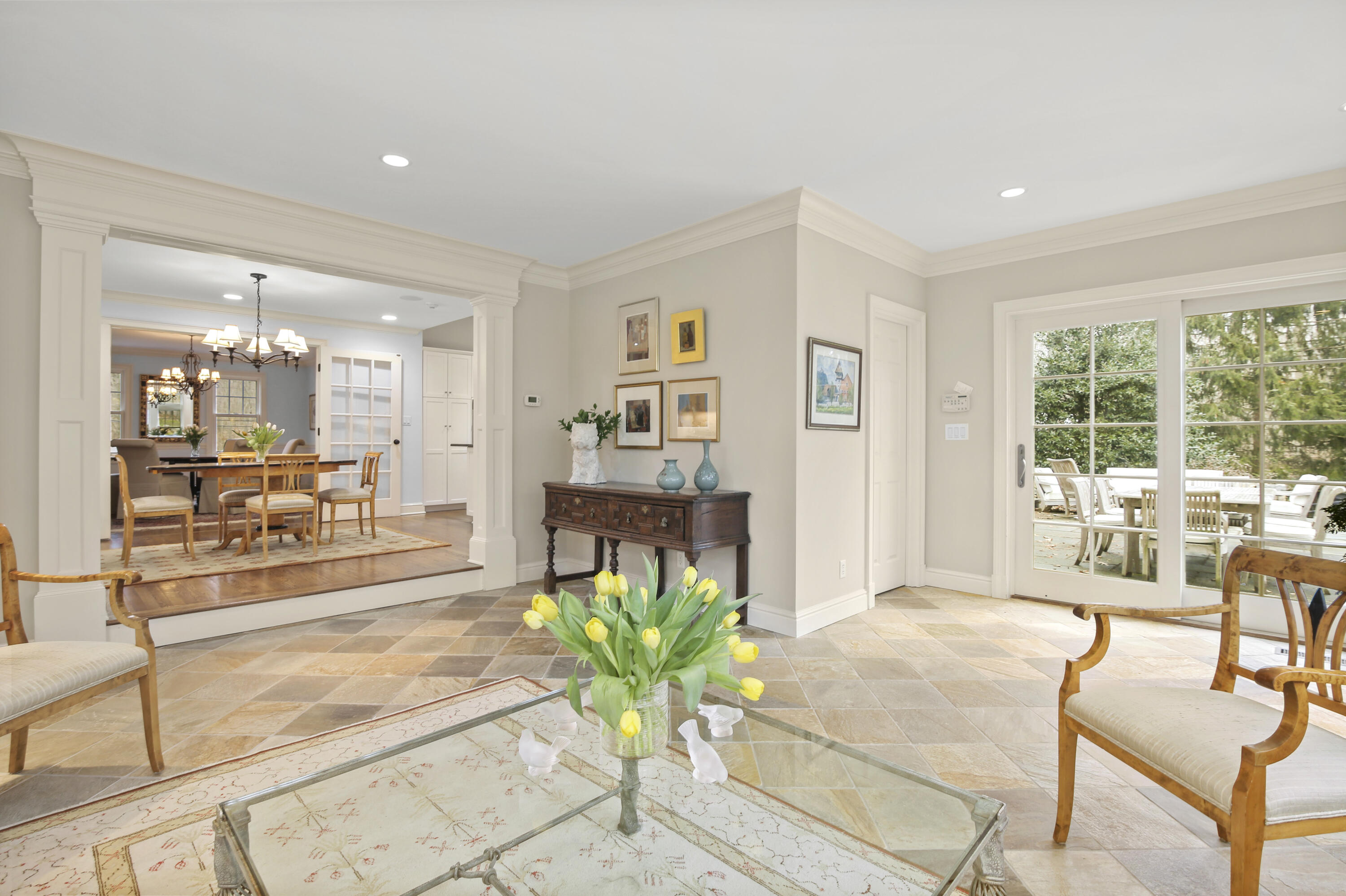 346 Frogtown Road New Canaan, CT 06840 - Photo 16 of 36 a living room with furniture and a large window