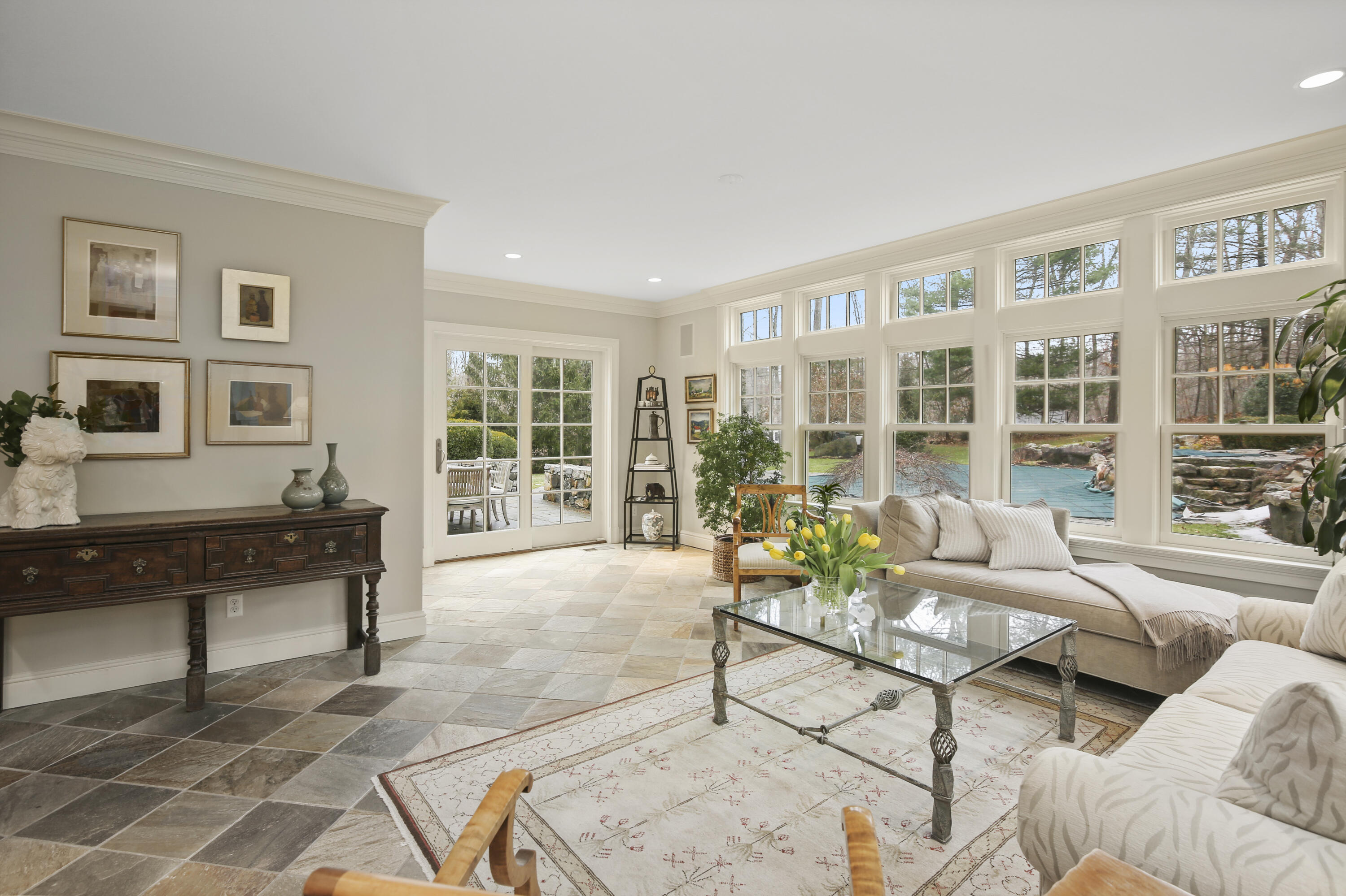 346 Frogtown Road New Canaan, CT 06840 - Photo 17 of 36 a living room with furniture and a potted plant