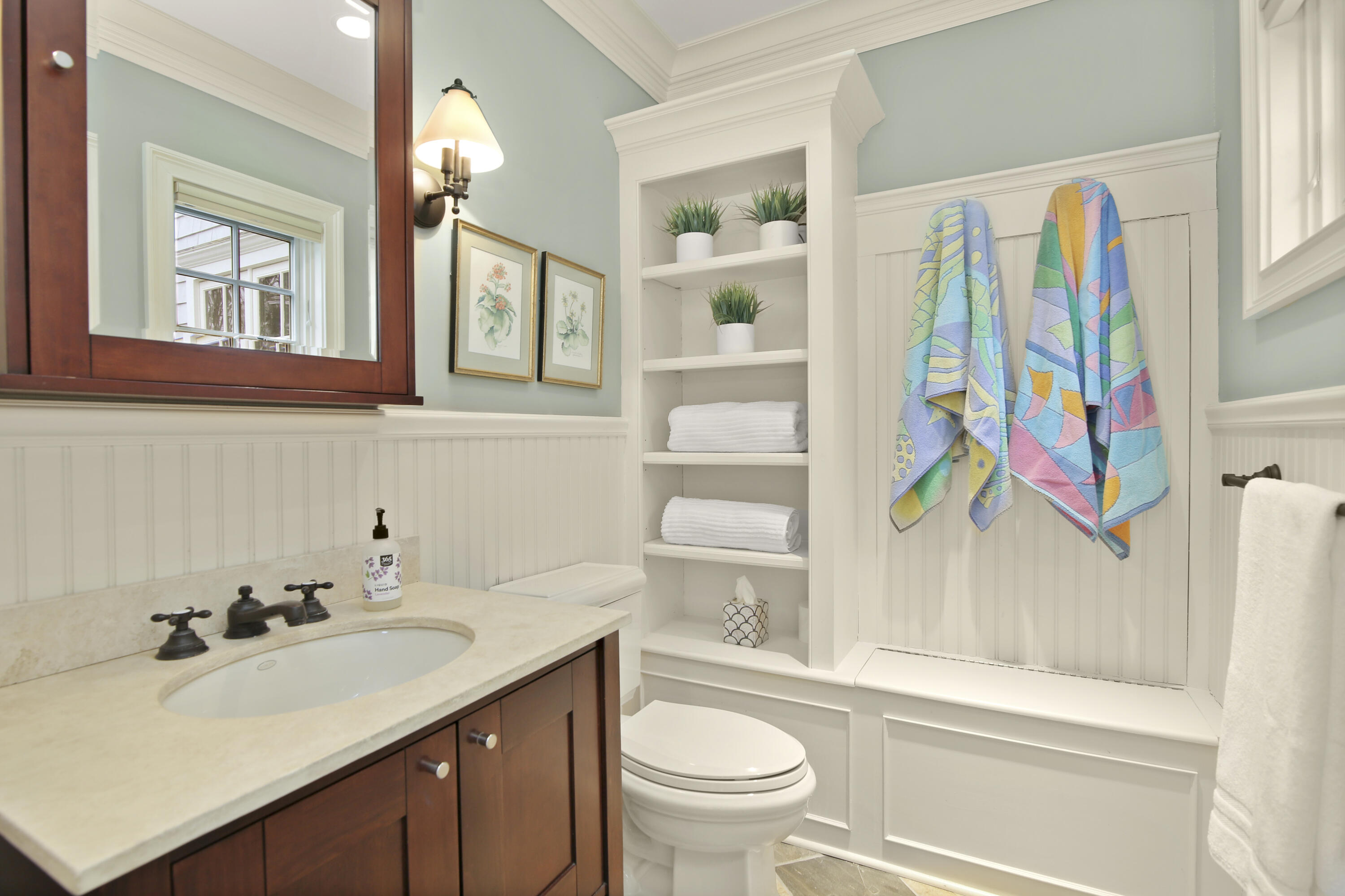 346 Frogtown Road New Canaan, CT 06840 - Photo 18 of 36 a bathroom with a sink vanity mirror and toilet