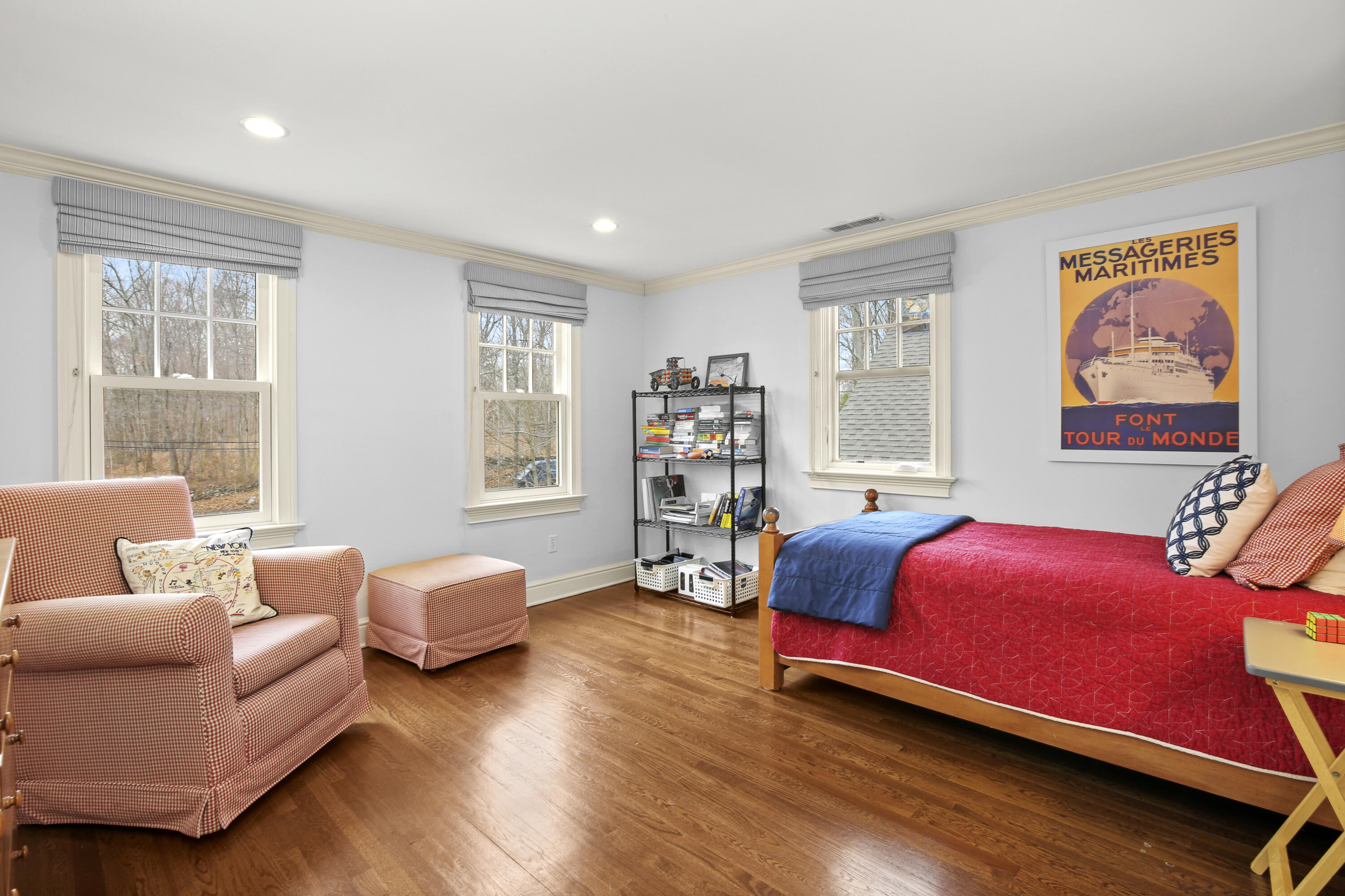 346 Frogtown Road New Canaan, CT 06840 - Photo 24 of 36 a bedroom with a bed and wooden floor