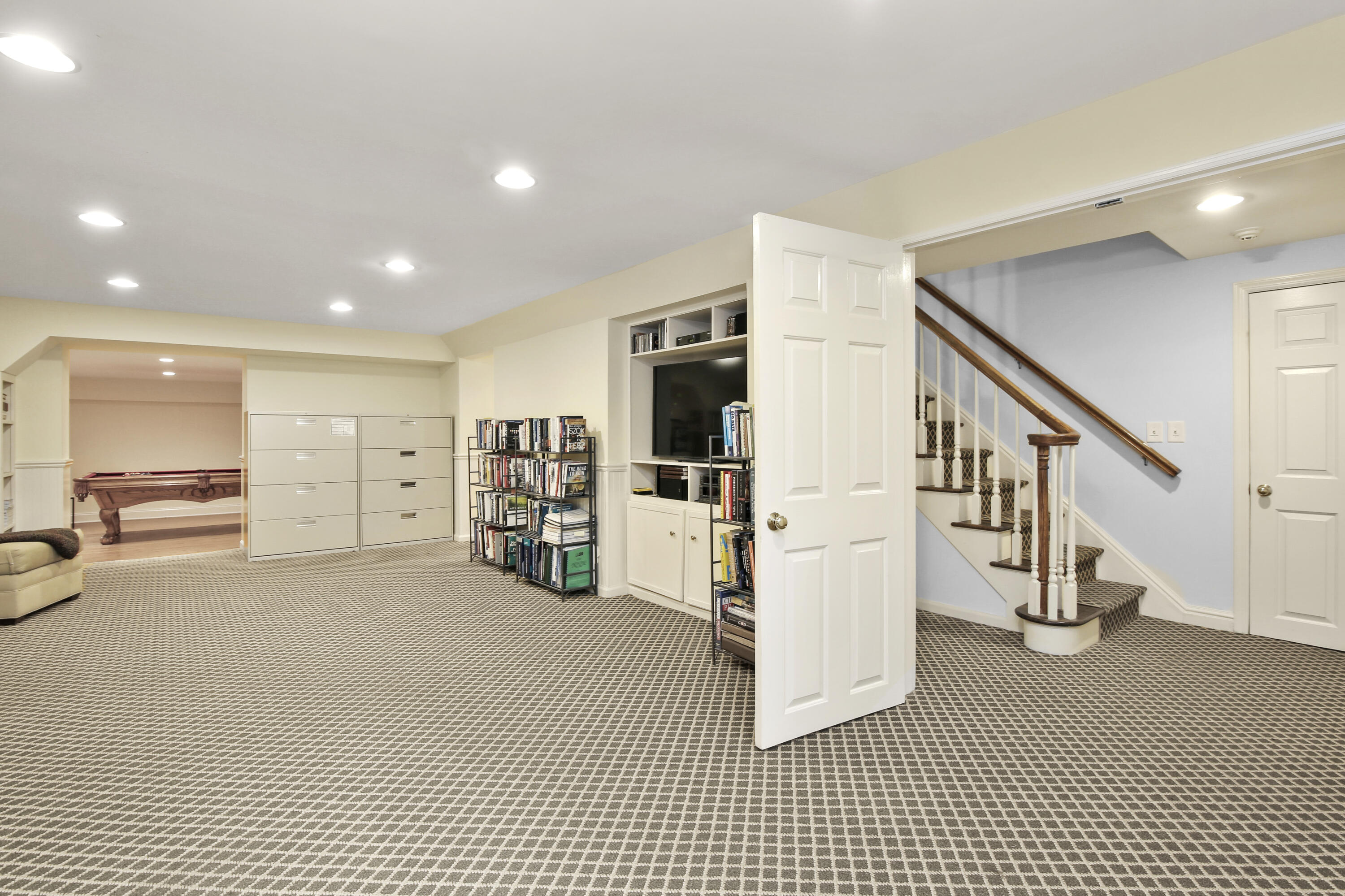 346 Frogtown Road New Canaan, CT 06840 - Photo 27 of 36 a view of a livingroom with furniture and an empty room