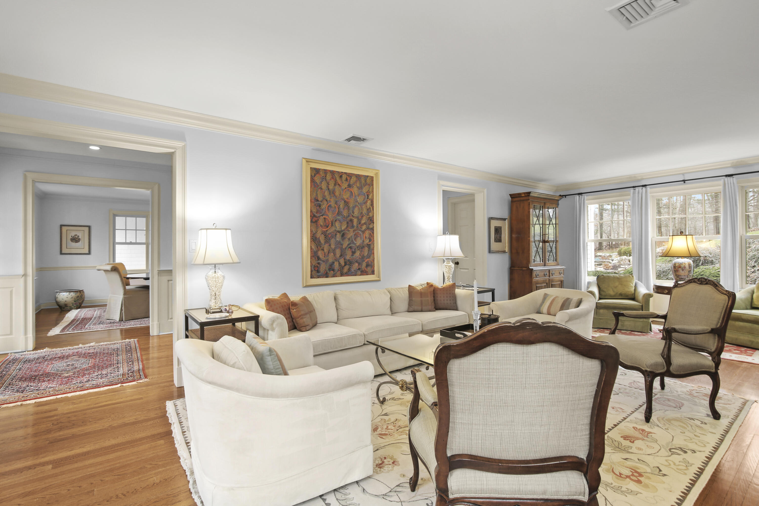 346 Frogtown Road New Canaan, CT 06840 - Photo 7 of 36 a living room with furniture and a large window