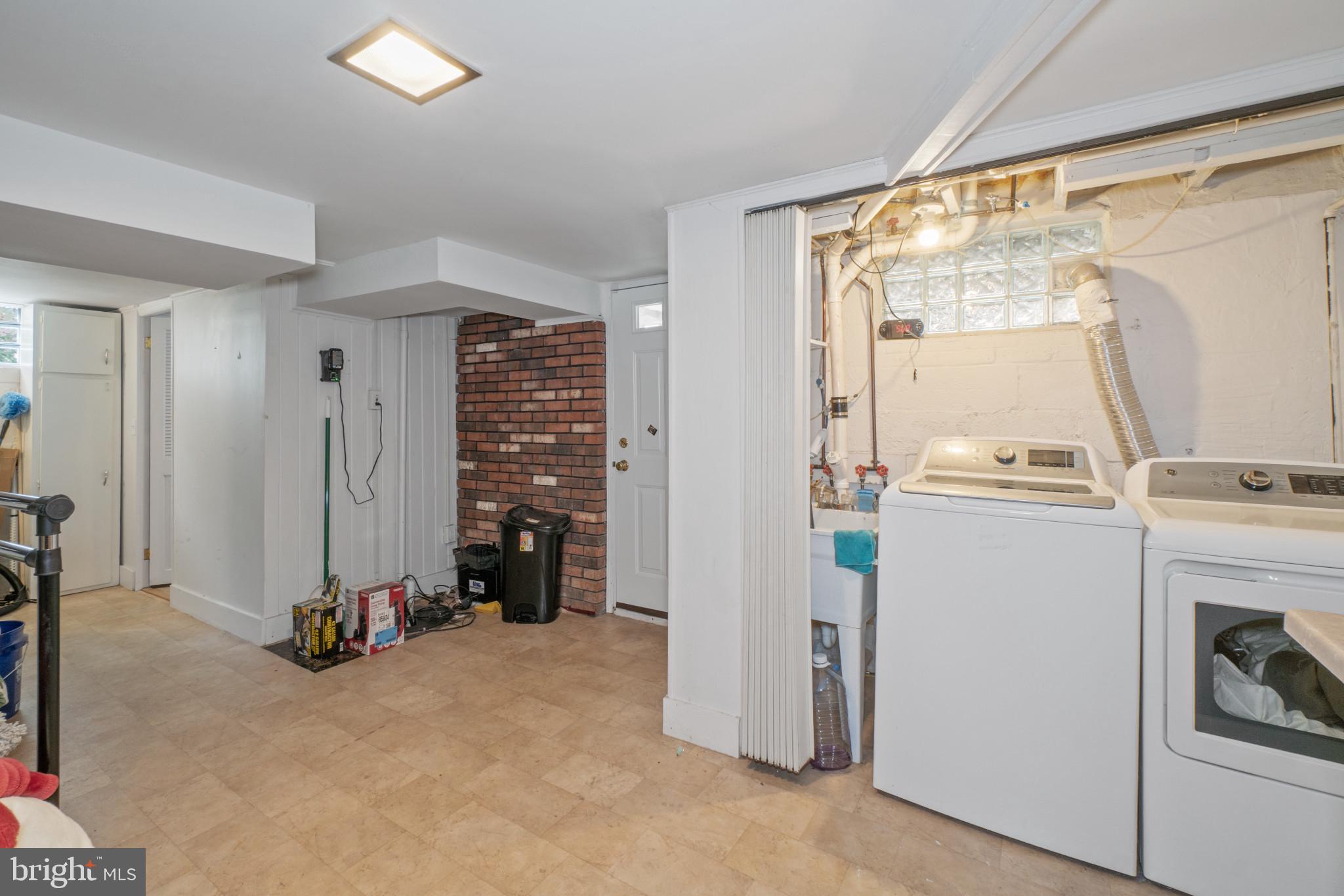 1931 Edgewood Road Towson, MD 21286 - Photo 15 of 22 a view of walk in closet with clothes and shoes