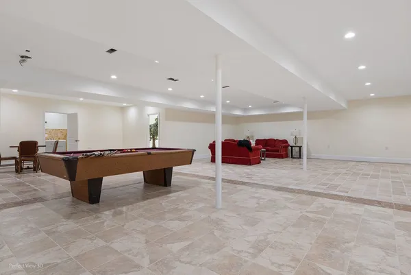 a utility room with sink dryer and washer