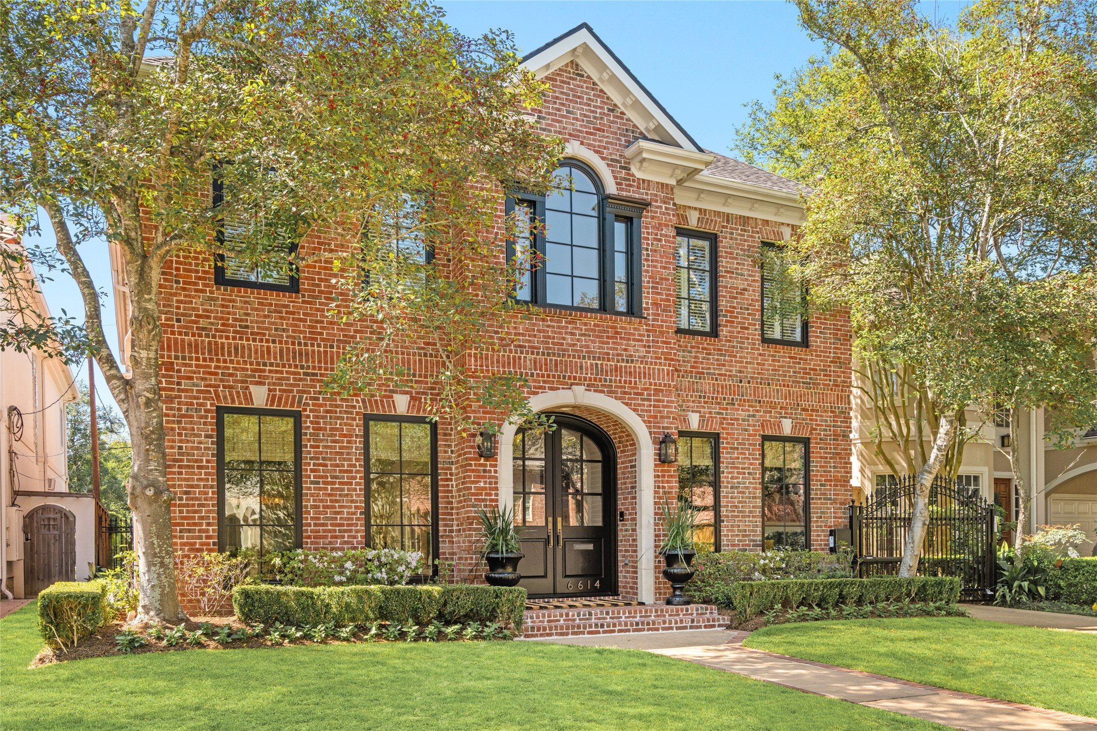 6614 Mercer Street Houston, TX 77005 - Photo 1 of 48 front view of a house with a yard