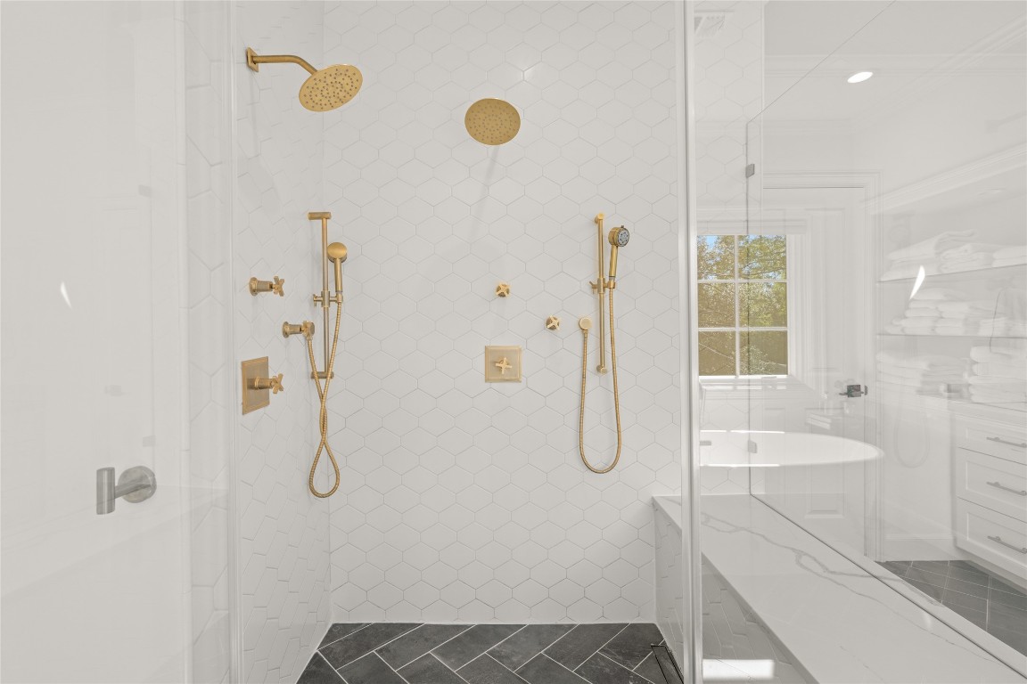 6614 Mercer Street Houston, TX 77005 - Photo 23 of 48 a bathroom with a sink and a shower