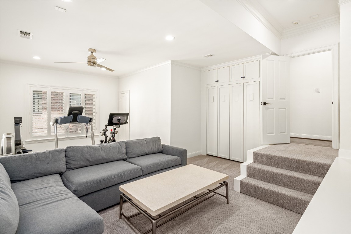 6614 Mercer Street Houston, TX 77005 - Photo 24 of 48 a living room with furniture and wooden floor