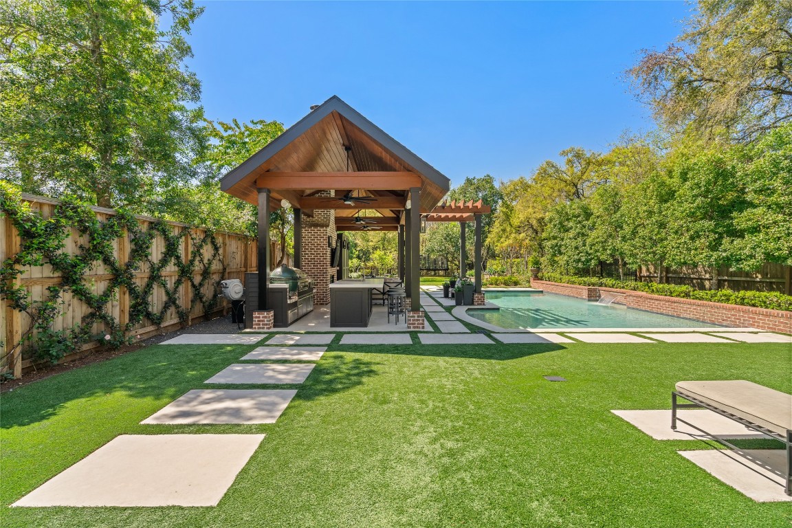 6614 Mercer Street Houston, TX 77005 - Photo 33 of 48 a view of outdoor space yard deck patio and swimming pool