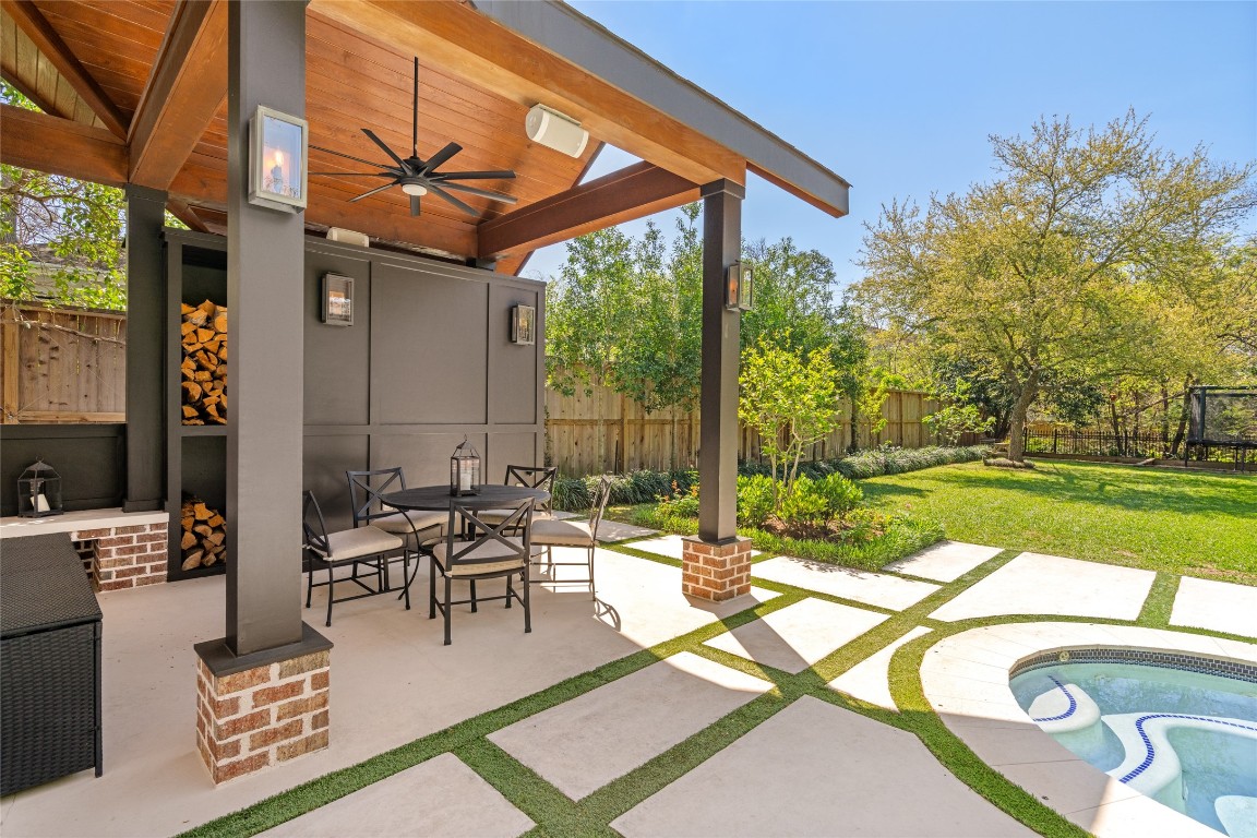 6614 Mercer Street Houston, TX 77005 - Photo 38 of 48 a building outdoor space with patio furniture and a potted plant