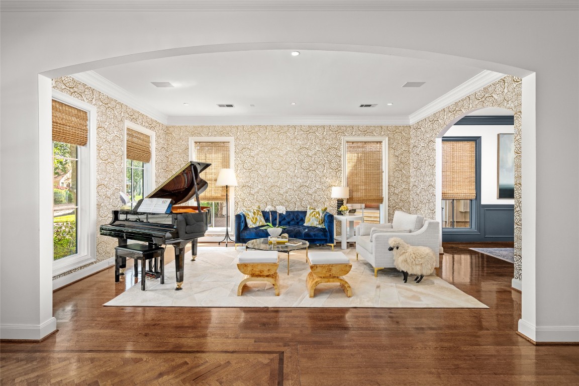 6614 Mercer Street Houston, TX 77005 - Photo 4 of 48 a living room with fireplace furniture and a large window