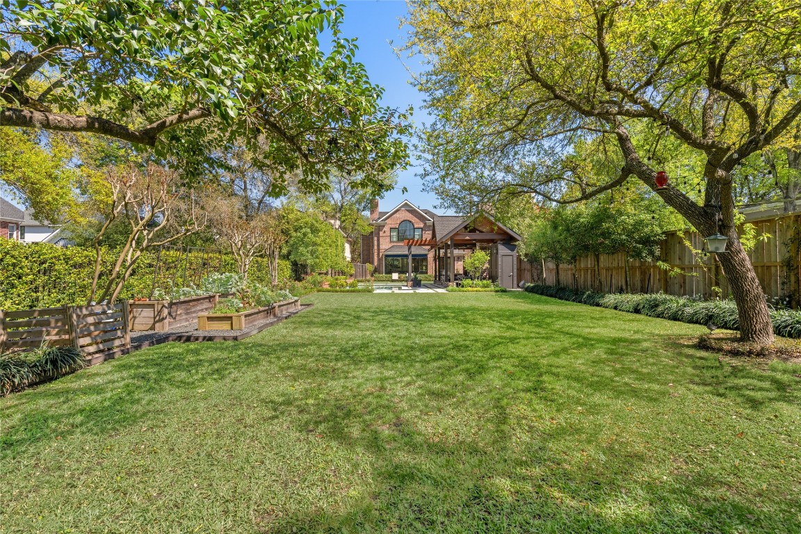 6614 Mercer Street Houston, TX 77005 - Photo 46 of 48 a view of house with backyard