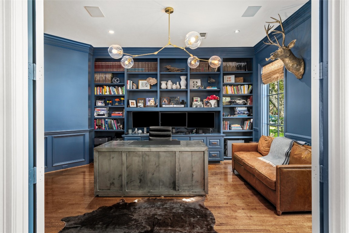 6614 Mercer Street Houston, TX 77005 - Photo 6 of 48 a living room with furniture a flat screen tv and a fireplace