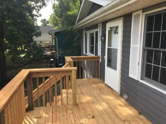 5707 Fox Lake Road McHenry, IL 60051 - Photo 3 of 14 a view of balcony with wooden floor and seating space