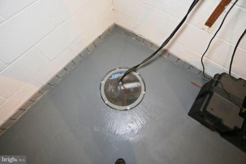 6610 Woodley Road Clinton, MD 20735 - Photo 19 of 24 Basement New Sump Pump And Backup Battery