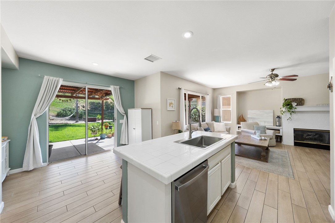 41309 Pine Tree Circle Temecula, CA 92591 - Photo 12 of 48 kitchen and family room