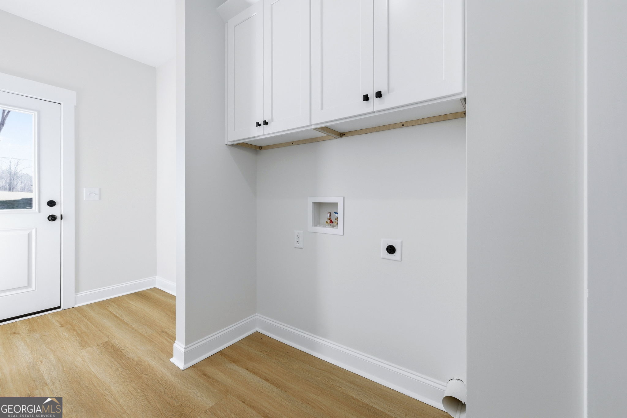 238 Carl Loudermilk Road Mount Airy, GA 30563 - Photo 12 of 28 a view of room with hardwood floor