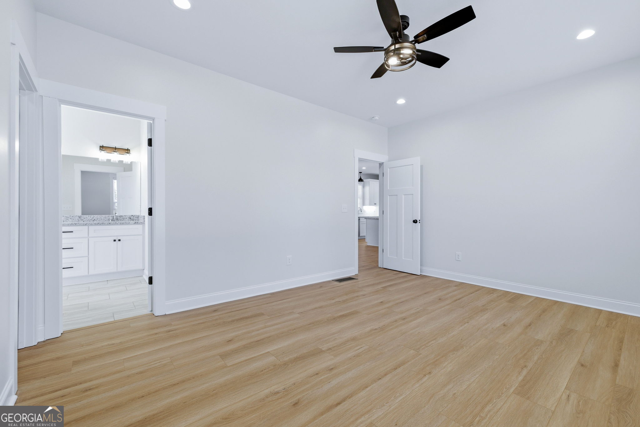 238 Carl Loudermilk Road Mount Airy, GA 30563 - Photo 14 of 28 wooden floor in an empty room