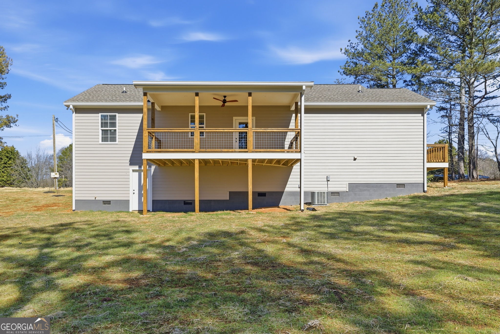 238 Carl Loudermilk Road Mount Airy, GA 30563 - Photo 28 of 28 a view of an house with backyard