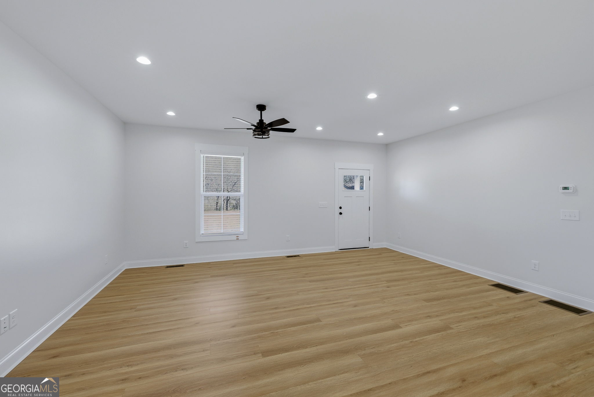 238 Carl Loudermilk Road Mount Airy, GA 30563 - Photo 5 of 28 a view of an empty room