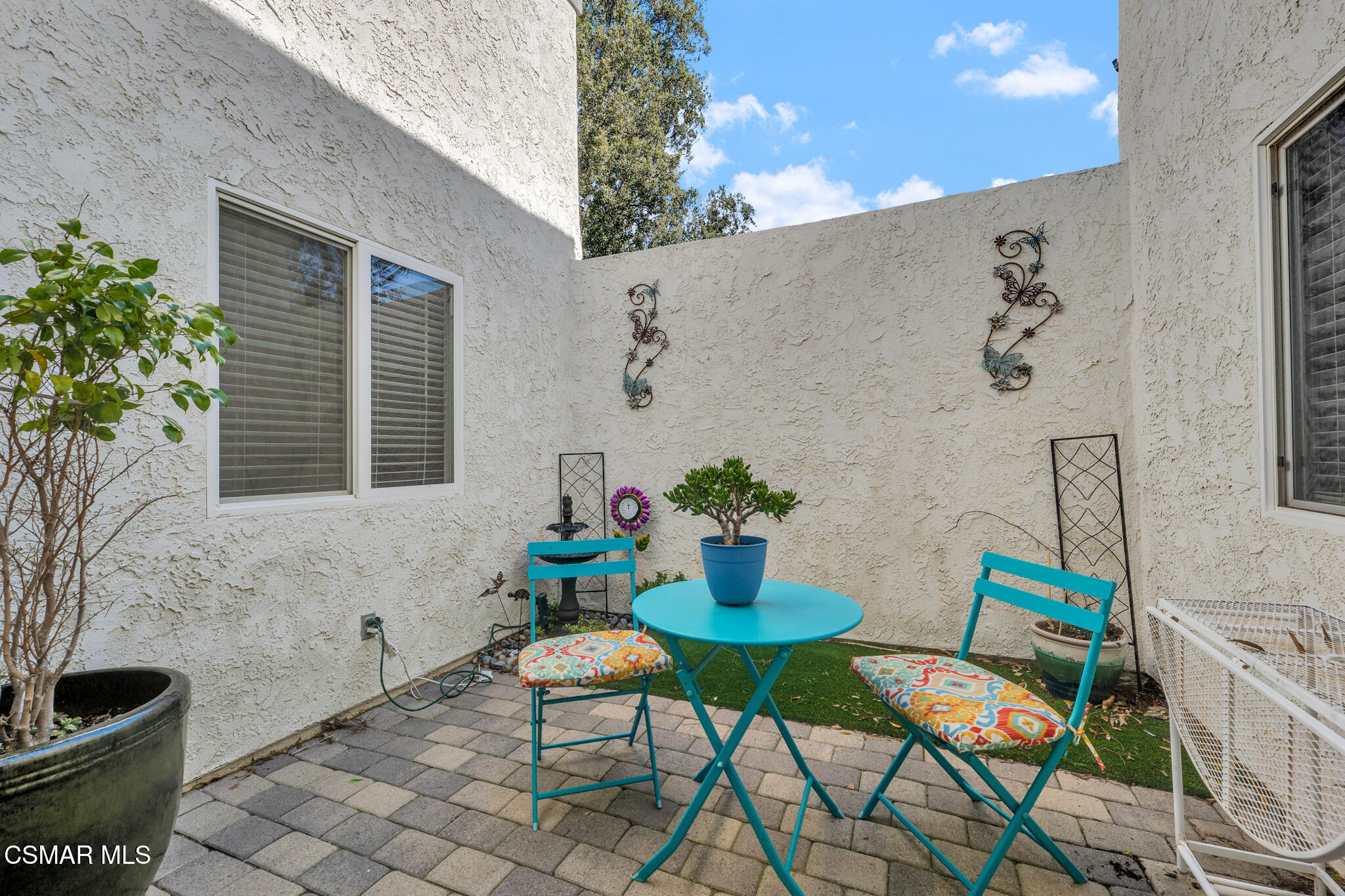 2474 Stow Street Simi Valley, CA 93063 - Photo 11 of 17 a backyard of a house with table and chairs