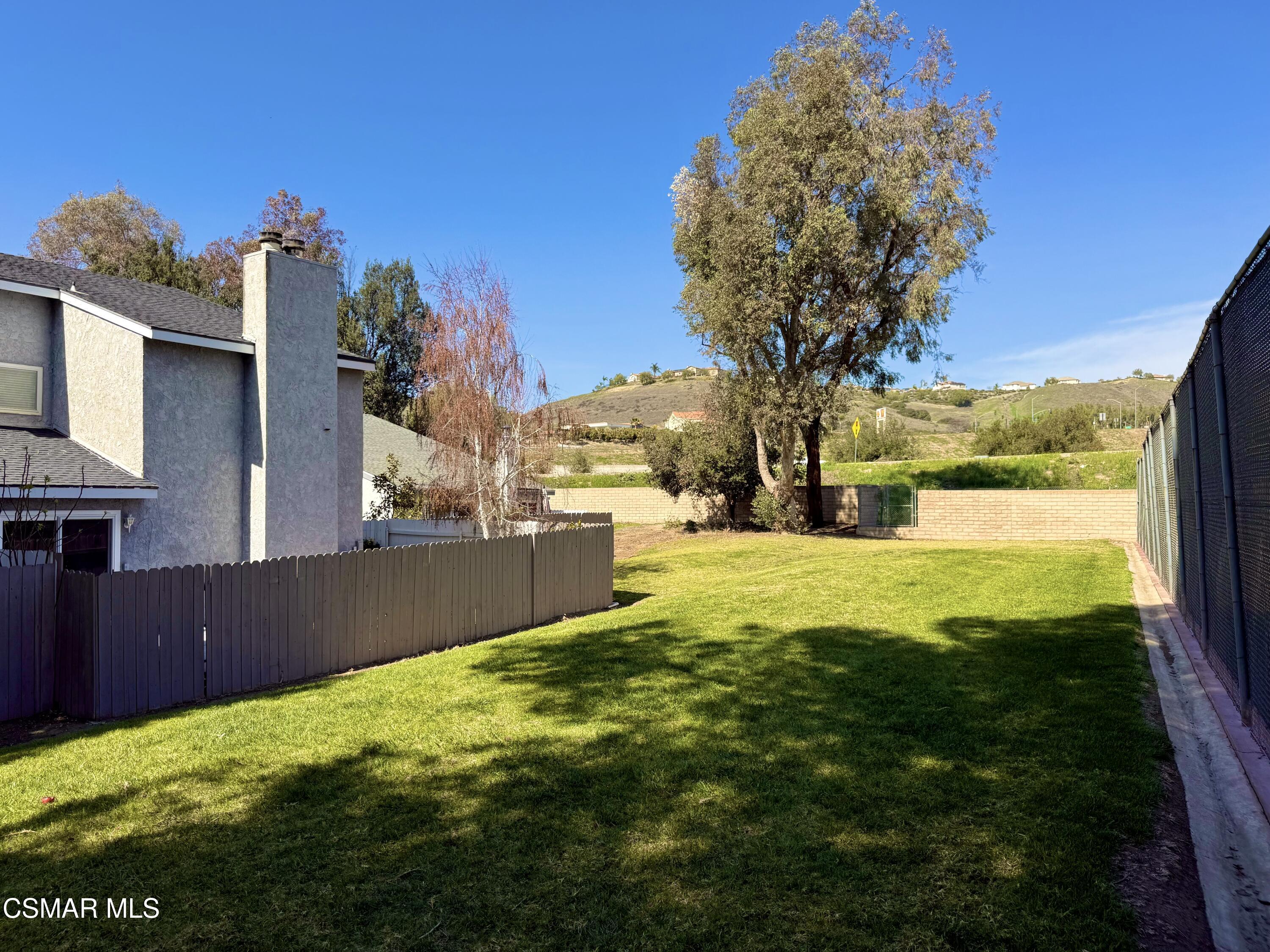 2474 Stow Street Simi Valley, CA 93063 - Photo 4 of 17 a view of an outdoor space and a yard