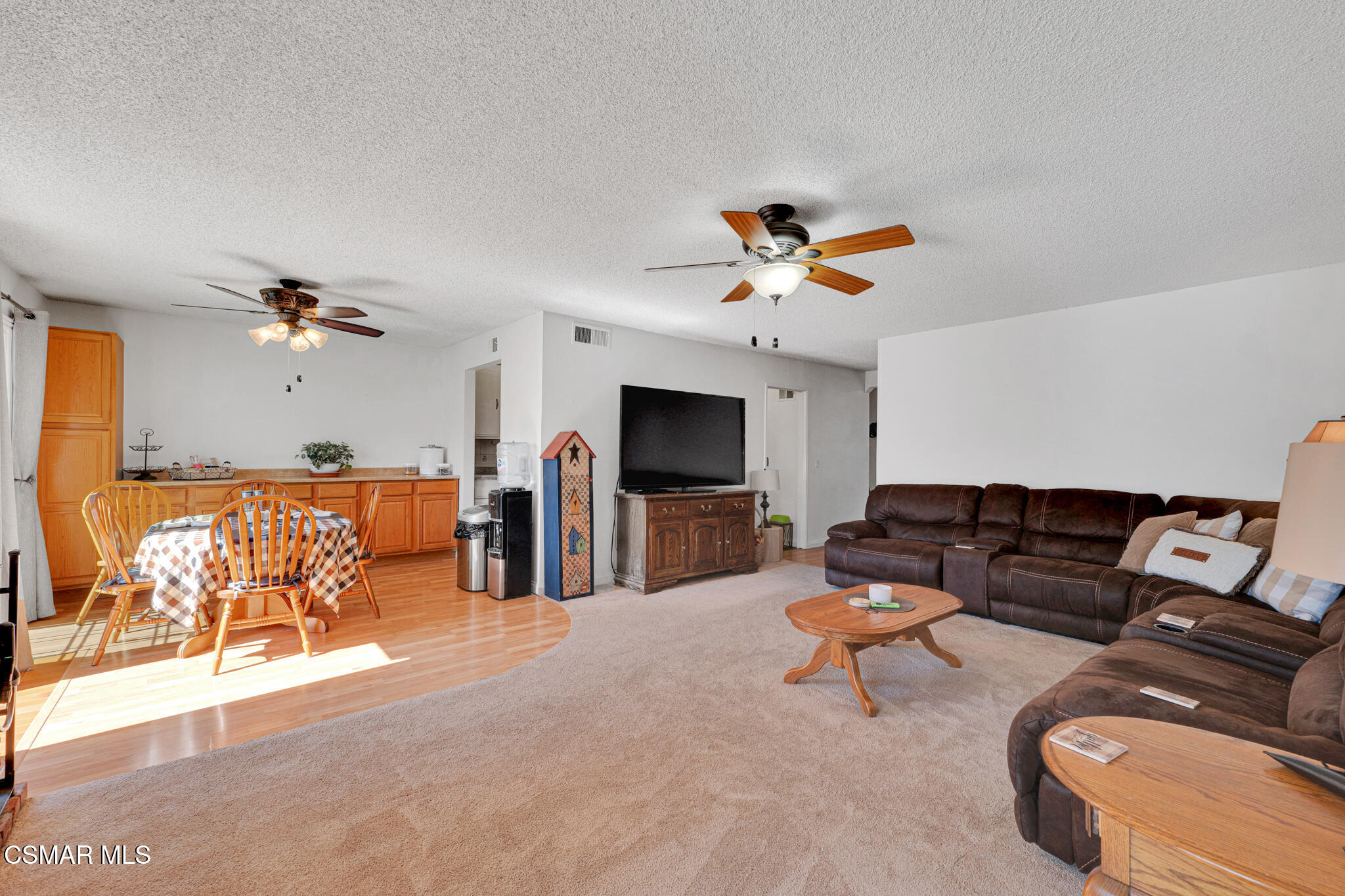 2474 Stow Street Simi Valley, CA 93063 - Photo 5 of 17 a living room with furniture and a flat screen tv