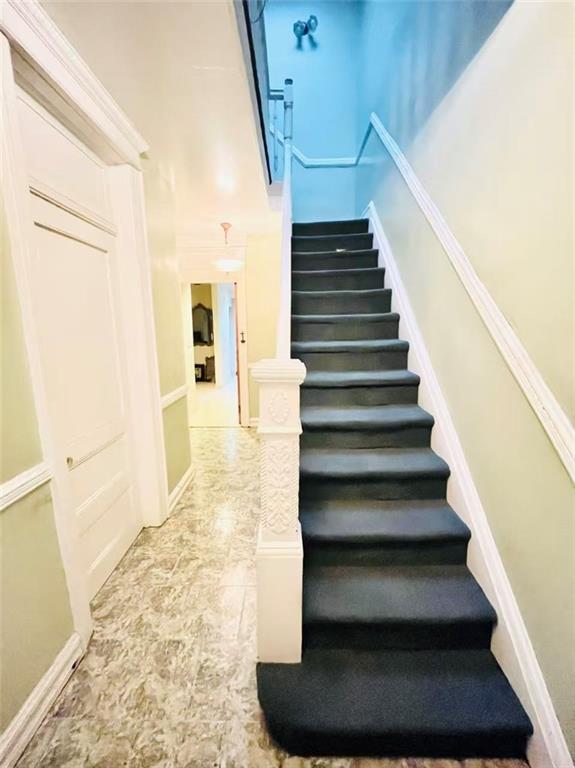 1673 83rd Street Brooklyn, NY 11214 - Photo 2 of 24 a view of entryway and hall with wooden floor
