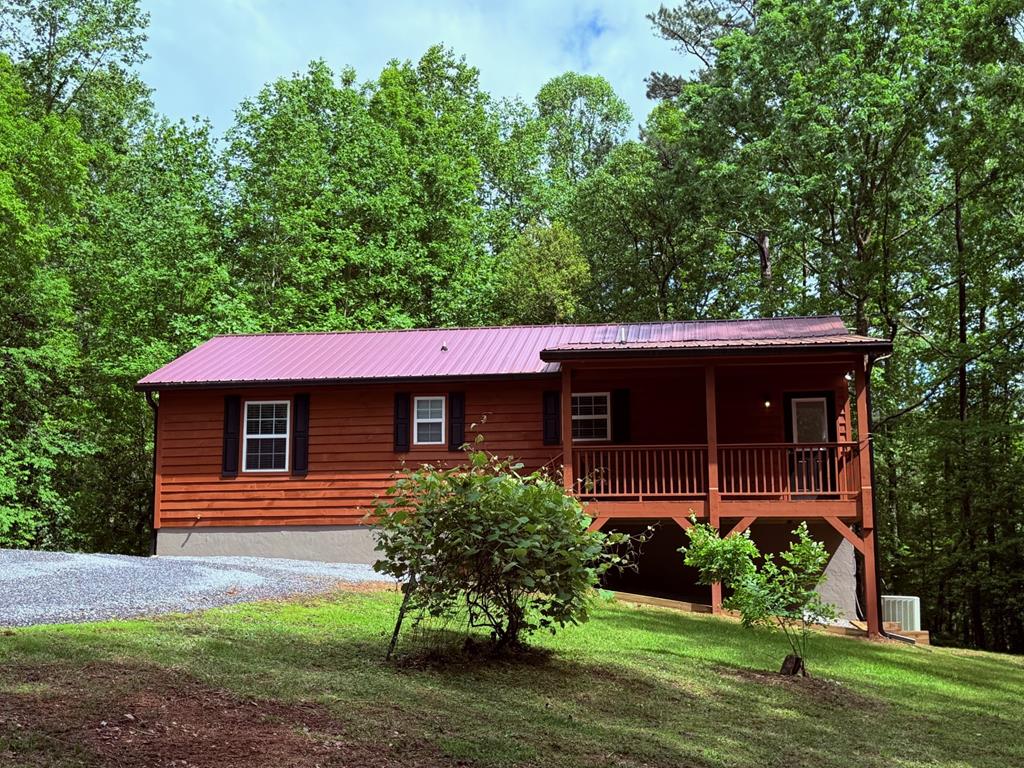 72 Victory Lane Murphy, NC 28906 - Photo 15 of 64 a front view of a house with garden