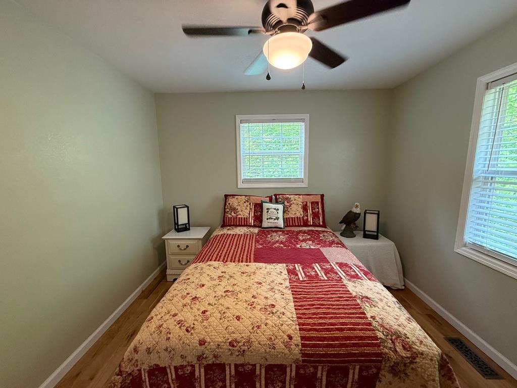 72 Victory Lane Murphy, NC 28906 - Photo 41 of 64 a bedroom with a bed and a window