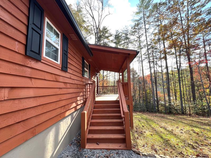 72 Victory Lane Murphy, NC 28906 - Photo 10 of 64 a view of a pathway with a house in the background