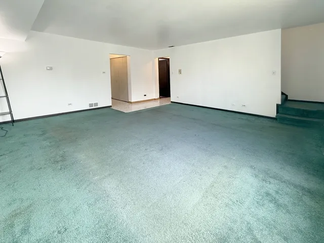 a kitchen with stainless steel appliances granite countertop a stove and a sink