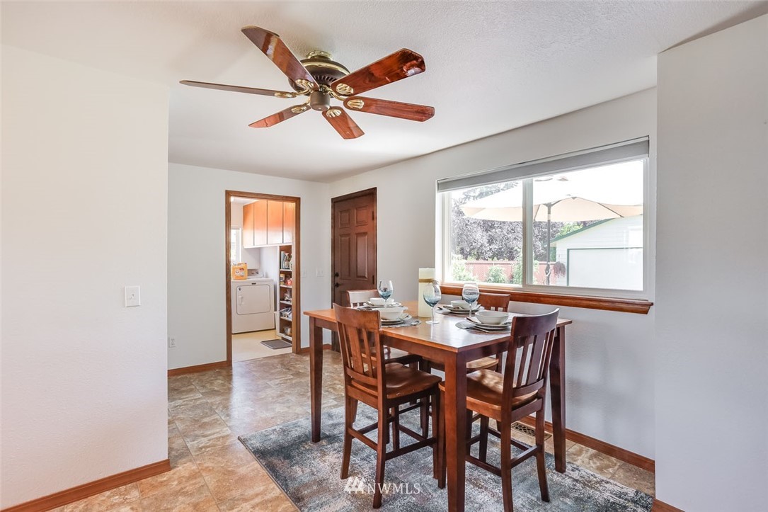 5209 Northeast 3rd Street Renton, WA 98059 - Photo 11 of 31 a view of a dining room with furniture window and outside view