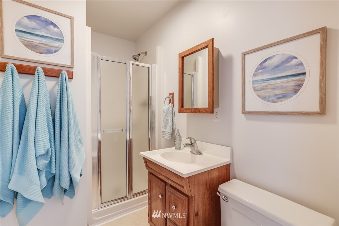 5209 Northeast 3rd Street Renton, WA 98059 - Photo 20 of 31 a bathroom with a sink and a mirror
