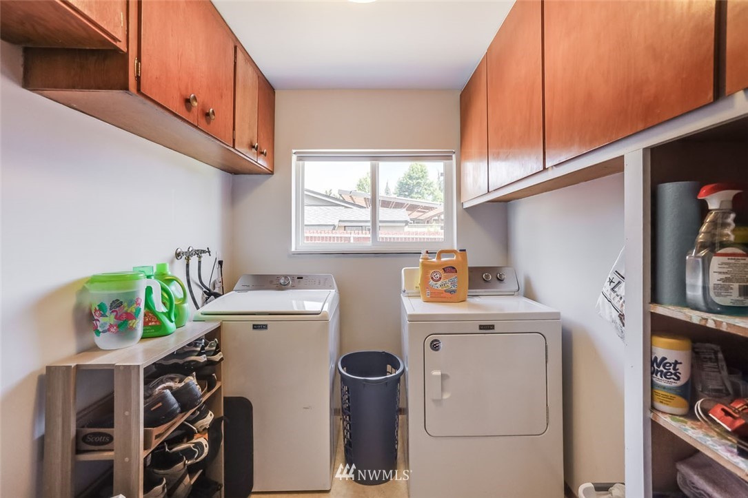 5209 Northeast 3rd Street Renton, WA 98059 - Photo 21 of 31 a utility room with fridge washer and dryer