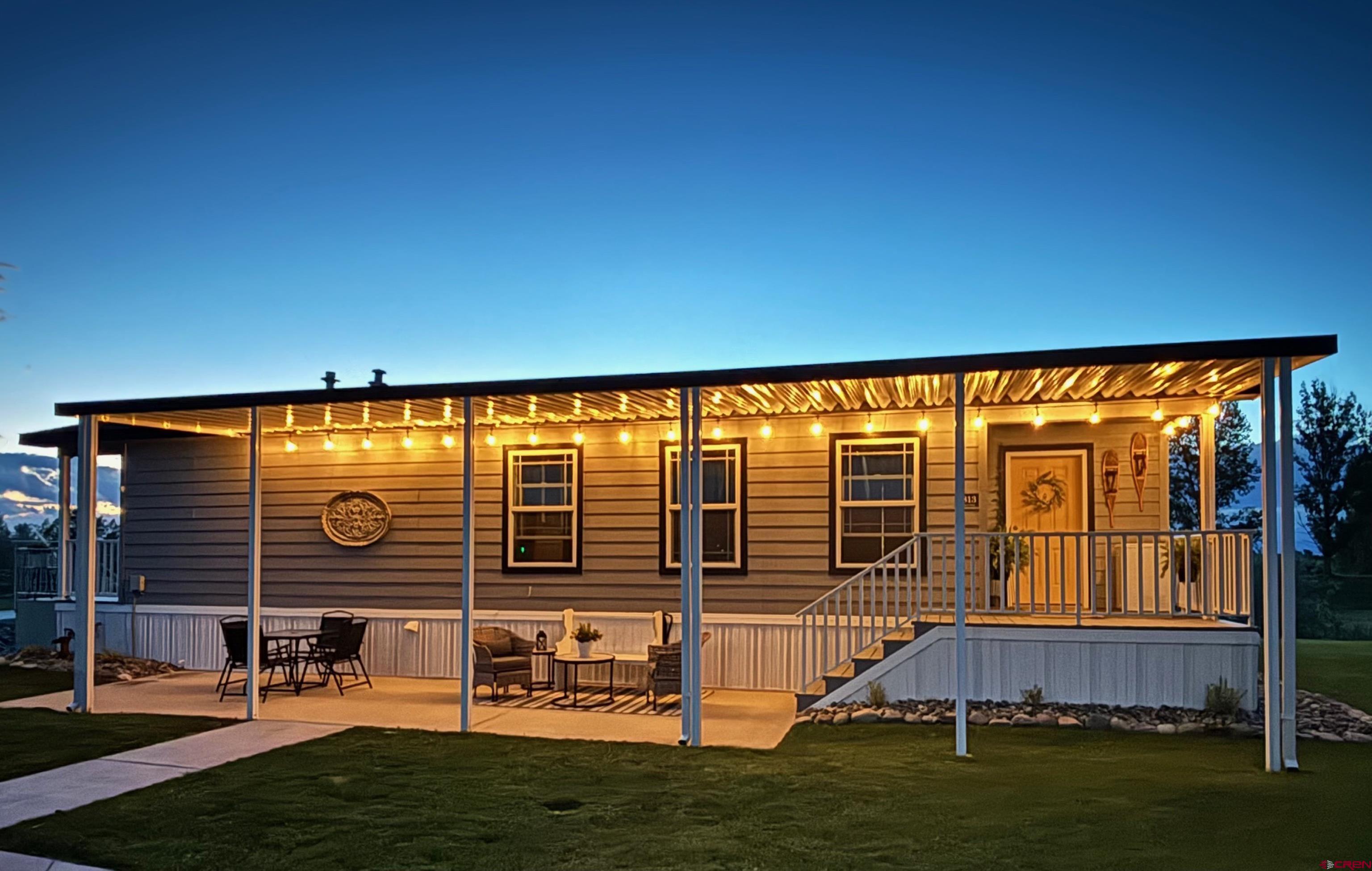 901 6530 Road, Unit 2813 Montrose, CO 81401 - Photo 1 of 34 a view of swimming pool with a yard