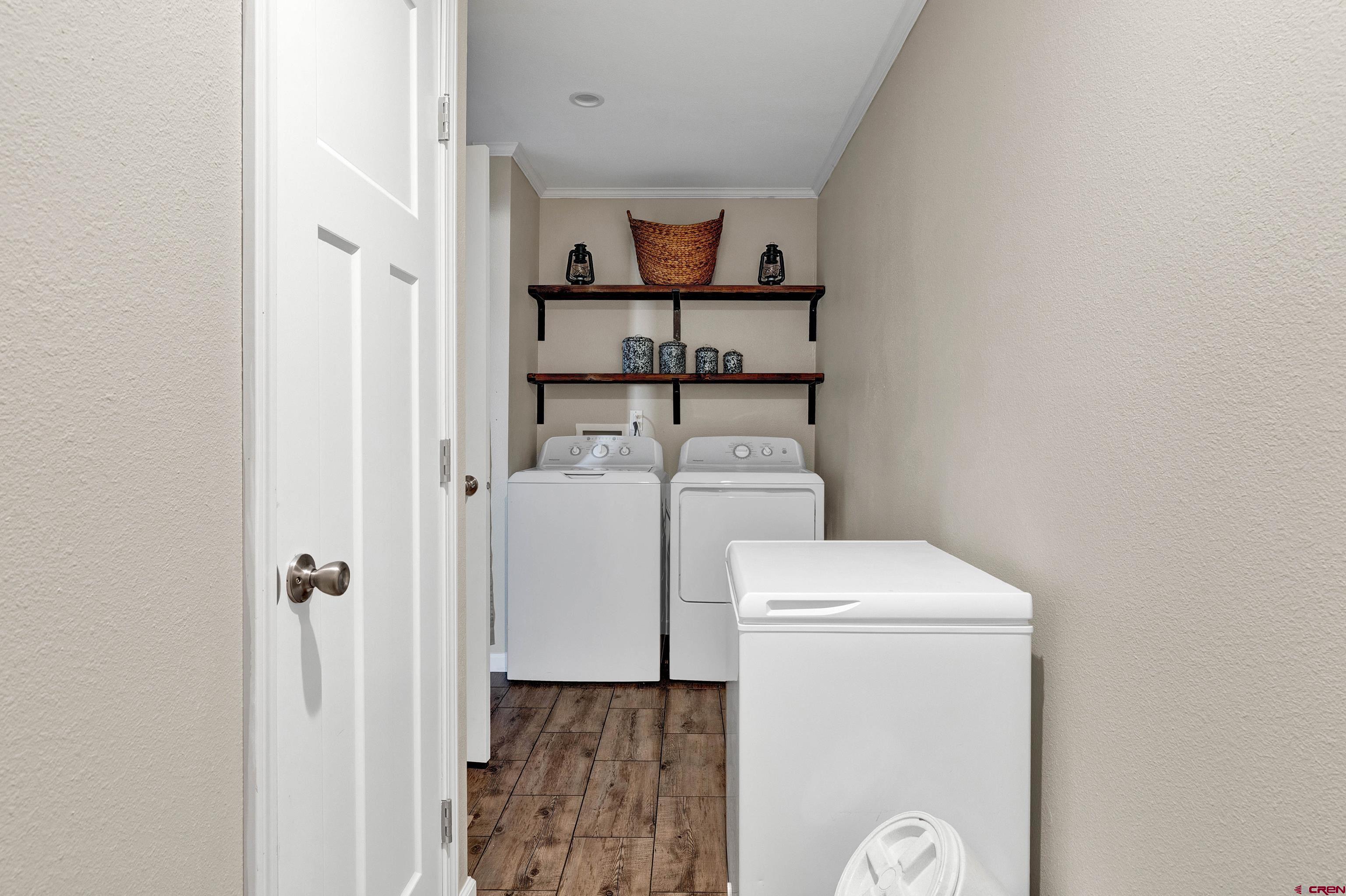 901 6530 Road, Unit 2813 Montrose, CO 81401 - Photo 21 of 34 a utility room with dryer and washer