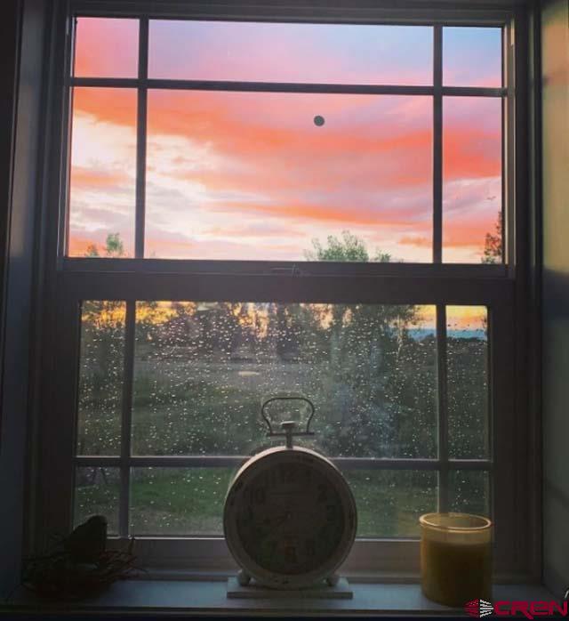 901 6530 Road, Unit 2813 Montrose, CO 81401 - Photo 22 of 34 a view of a floor to ceiling window in an empty room