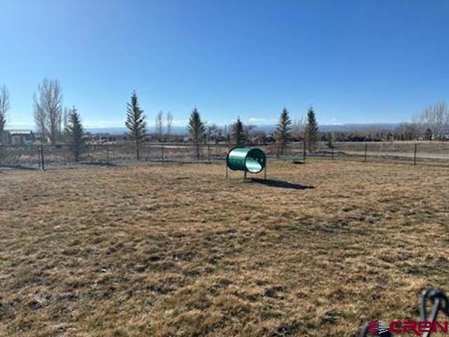 901 6530 Road, Unit 2813 Montrose, CO 81401 - Photo 27 of 34 a view of a wooden floor with a lake