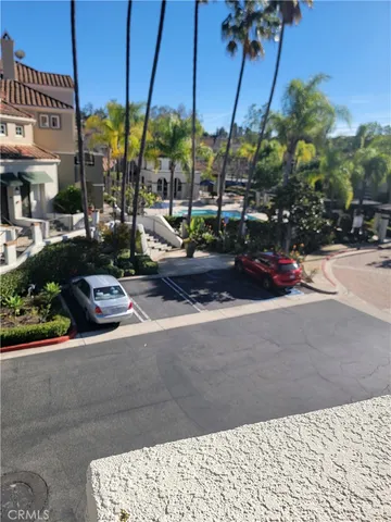 a view of a street with cars